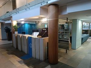 a lobby of an office with a reception counter at 501 Canal Quays in Cape Town