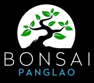 a logo of a tree in front of a white circle at Bonsai Jacuzzi Suites in Panglao Island