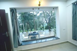 Fotografie z fotogalerie ubytování Archana Resorts v destinaci Madikeri