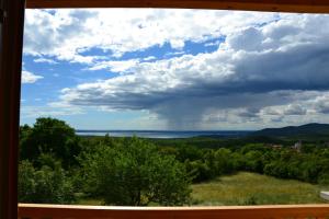 a view of the ocean from a window at Agriturismo Gradec in Aurisina