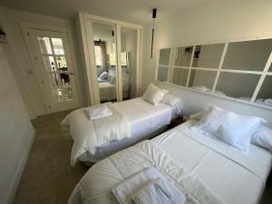 Postel nebo postele na pokoji v ubytování Penthouse Puerta de Pedregalejo