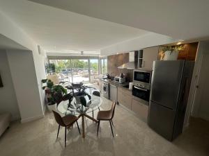 Kuchyň nebo kuchyňský kout v ubytování Penthouse Puerta de Pedregalejo