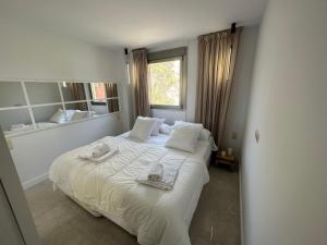 Postel nebo postele na pokoji v ubytování Penthouse Puerta de Pedregalejo