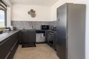 A kitchen or kitchenette at KAY SE MI