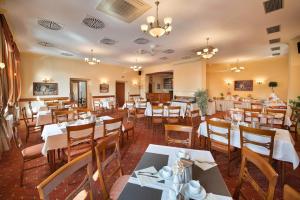 A restaurant or other place to eat at Hotel Podhrad