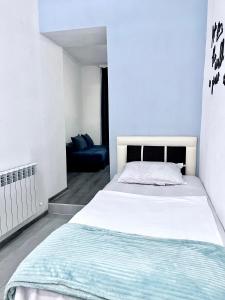 Кровать или кровати в номере Hotel Sunny