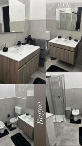 a bathroom with a sink and a toilet and a mirror at La piccola casetta del centro in Palermo