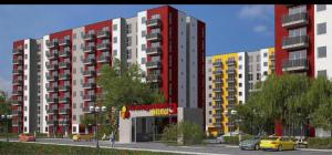 uma representação de um grande edifício de apartamentos com estacionamento em Luxury Apartments em Selimbar