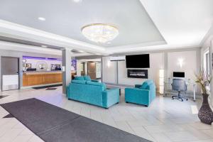 TV a/nebo společenská místnost v ubytování Travelodge by Wyndham Miramichi New Brunswick