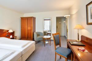 Posteľ alebo postele v izbe v ubytovaní Austria Trend Hotel Schloss Wilhelminenberg Wien