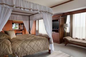 Postelja oz. postelje v sobi nastanitve Hyatt Regency Yogyakarta
