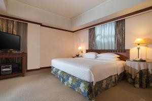 Postelja oz. postelje v sobi nastanitve Hyatt Regency Yogyakarta