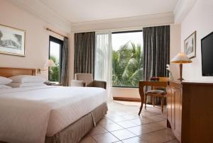 Postelja oz. postelje v sobi nastanitve Hyatt Regency Yogyakarta