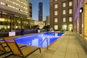 a swimming pool in the middle of a building at Residence Inn Houston Downtown/Convention Center in Houston