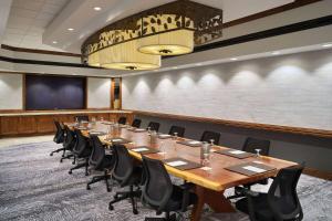 a conference room with a long table and chairs at Cheyenne Mountain Resort, a Dolce by Wyndham in Colorado Springs