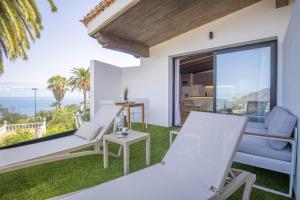 a villa with a view of the ocean at Maresía Village in Los Realejos