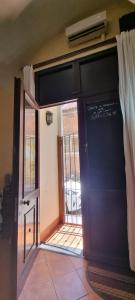 an open door to a room with an open door at My Loft Catania in Catania