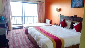Postel nebo postele na pokoji v ubytování Hotel Chautari pvt ltd
