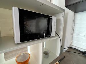 A television and/or entertainment centre at Celia's Home - Expo Fiera Milano Még 4 kép