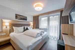 Voodi või voodid majutusasutuse rechenau LIVING & RELAX toas