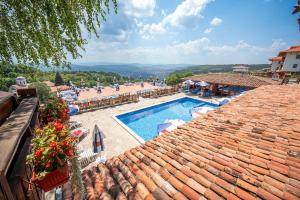 a view from the roof of a resort with a swimming pool at Sevastokrator Relax & Congress in Arbanasi