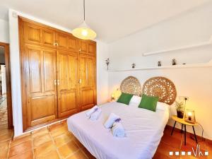 Ein Bett oder Betten in einem Zimmer der Unterkunft VH CostaBlanca - MARIPOSA