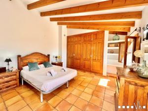 Ein Bett oder Betten in einem Zimmer der Unterkunft VH CostaBlanca - MARIPOSA
