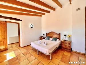 Ein Bett oder Betten in einem Zimmer der Unterkunft VH CostaBlanca - MARIPOSA