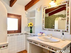 Ein Badezimmer in der Unterkunft VH CostaBlanca - MARIPOSA