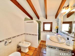 Ein Badezimmer in der Unterkunft VH CostaBlanca - MARIPOSA