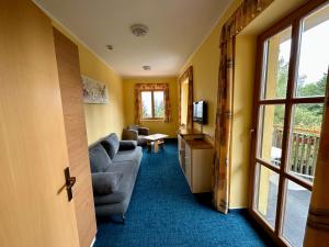 TV a/nebo společenská místnost v ubytování Hotel Zarja