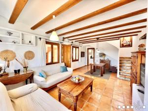 Ein Sitzbereich in der Unterkunft VH CostaBlanca - MARIPOSA