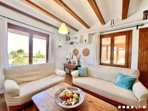 Ein Sitzbereich in der Unterkunft VH CostaBlanca - MARIPOSA