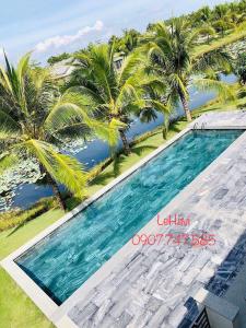 Bazén v ubytování 10_Biệt thự Cao cấp View Hồ_350m2 BBQ hồ bơi sân vườn_gần cầu ra biển nebo v jeho okolí