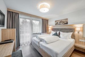 Voodi või voodid majutusasutuse rechenau LIVING & RELAX toas