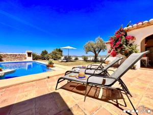 Der Swimmingpool an oder in der Nähe von VH CostaBlanca - MARIPOSA