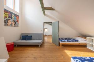 Postel nebo postele na pokoji v ubytování Zámecký Hostel Litomyšl
