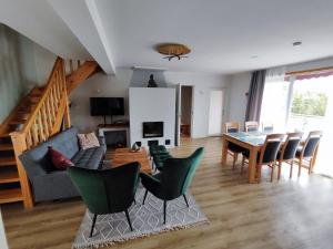 TV a/nebo společenská místnost v ubytování Kivika