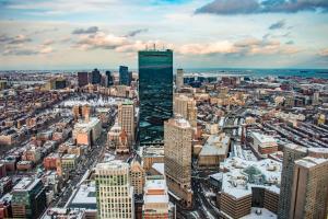 an aerial view of a city with a tall skyscraper at Courtyard Boston Copley Square in Boston