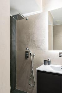 a bathroom with a shower and a sink at Academy Elegant Apartment #302 in Athens