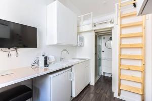 Kuchyň nebo kuchyňský kout v ubytování Lavie Maison Bordeaux Bliss Studio