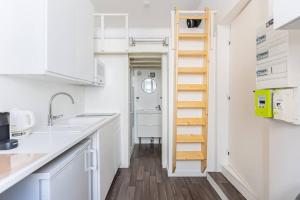 Kuchyň nebo kuchyňský kout v ubytování Lavie Maison Bordeaux Bliss Studio