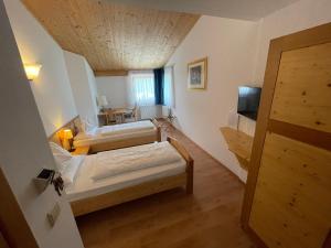 Postel nebo postele na pokoji v ubytování Hotel Meisules