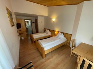 Postel nebo postele na pokoji v ubytování Hotel Meisules
