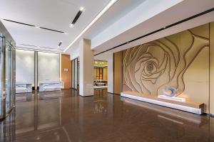 a large room with a painting on the wall at Fairfield by Marriott Beijing Daxing Airport in Beijing