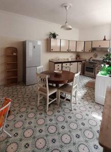 Η κουζίνα ή μικρή κουζίνα στο Casa Rosa Portogallo