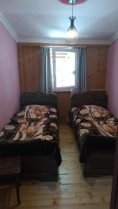 Een bed of bedden in een kamer bij Guesthouse Solomon
