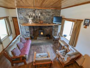 TV a/nebo společenská místnost v ubytování Clogher Cottage