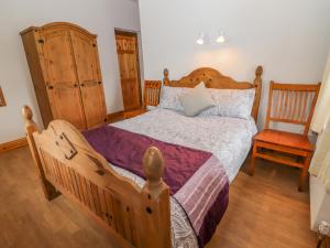 Postel nebo postele na pokoji v ubytování Clogher Cottage