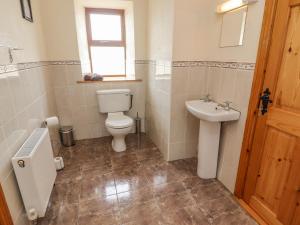 Koupelna v ubytování Clogher Cottage